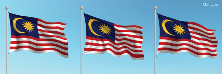 Set of three flags of Malaysia waving on flagpoles