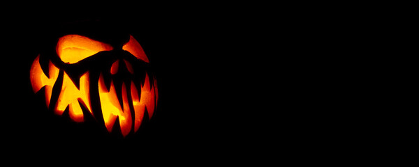 Real Jack O Lantern for halloween isolated on black background	
