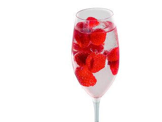 A sleek, clean photo of a champagne flute filled with sparkling water and vibrant red raspberries. The transparent glass and white background create a modern and minimalist aesthetic, emphasizing the 