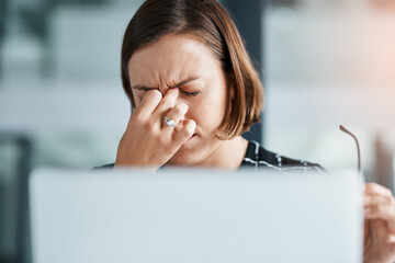 Business, woman and headache with laptop in office for fatigue, brain fog and anxiety of project...