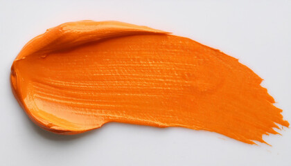 Orange oil paint smudge on white background.