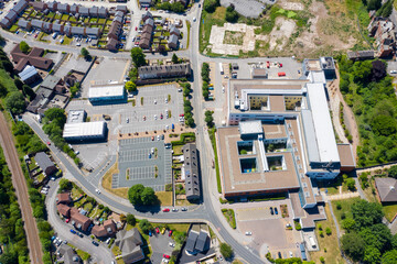Straight down top aerial photo of the Pontefract Hospital located in the village of Pontefract in Wakefield in the UK on a sunny summers day showing the Hospital and grounds