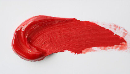 Red oil paint smudge on white background.