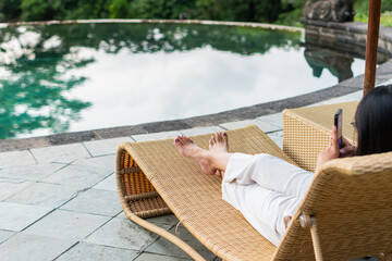 Relaxing Feet by the Poolside