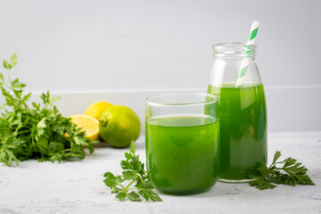 Green healthy detox, lemon and parsley juice. Green vegetable smoothie