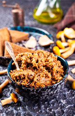 Mushroom pate in a bowl with toast