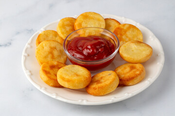 Hash Browns triangle patties in the bowl - Turkish name; patates koftesi