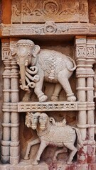 Sculpture of an elephant with seven trunks and a horse with five heads on Hatkeshwar Temple, Vadnagar, Mehsana, Gujarat, India.