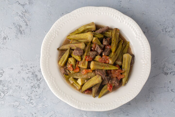 Bamya, Turkish traditional food. (Turkish cuisine) Homemade Food Okra in Plate. Organic Food.