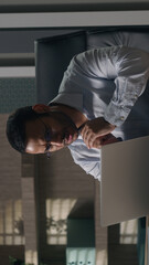 Indian man businessman American investor broker rub hands hoping wish to win lose with laptop at office feel annoyed having problems with computer angry bad result failure data loss password wrong