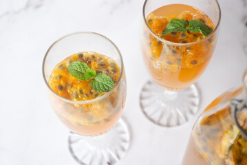 Kombucha second fermentation with passion fruit flavor. home-brew passion fruit flavor Kombucha in...