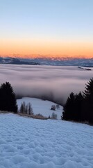Fototapeta premium Snowy Mountain Landscape with Fog and Sunset.