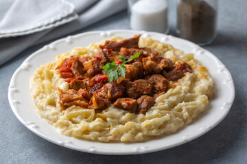 Turkish Food Hunkar Begendi made with Eggplant and Meat.
