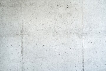 A seamless, textured concrete wall, ideal for backdrop use in design, architecture, and construction projects with a minimalistic aesthetic.