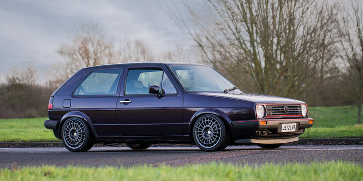 1992 purple Volkswagen Golf gti car