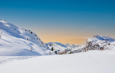 Obraz premium the beautiful snow-capped Italian Dolomites here on the Valparola Pass a few km above Cortina d'Ampezzo