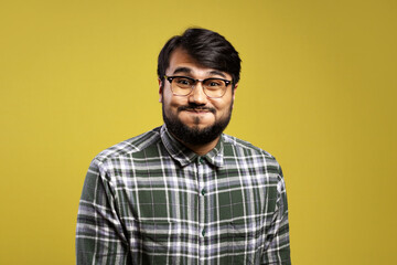 Brazilian man wearing long sleeve button down shirt