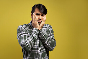 Brazilian man wearing long sleeve button down shirt