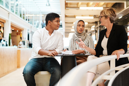 Meeting, planning and workshop with business people in office for support, training or mentor. Collaboration, networking and development with employees in startup for communication and mission