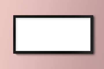 Black picture frame mockup hanging on a pink wall