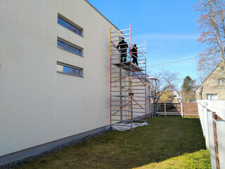 Facade renovation, washing and painting walls
