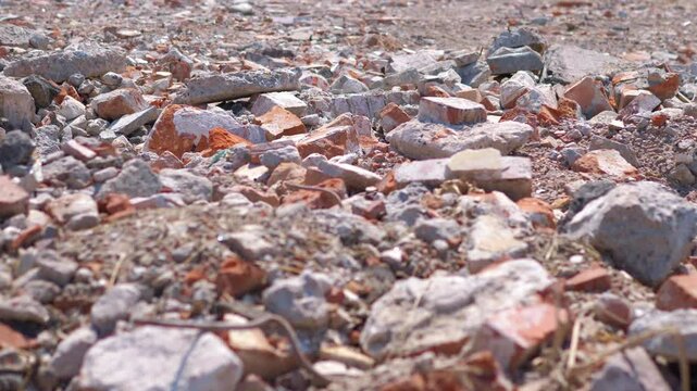 View of rubble and ruins on the ground in 4K slow motion 60fps