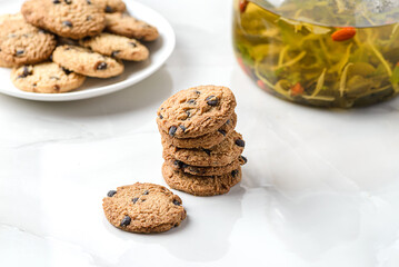 chocolate chip cookies on a white plate