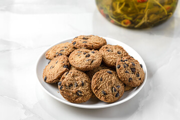 chocolate chip cookies on a white plate
