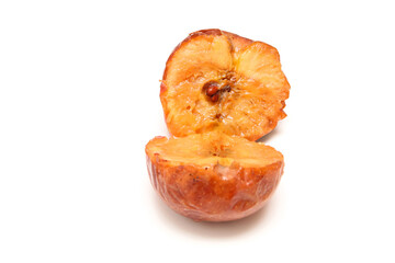 A picture of the fallen down and rotten apple. Starting to ferment and beginning to be moldy. 