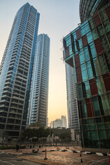 Fototapeta premium City high rise buildings, morning awakening city.