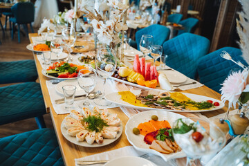 An Elegant Banquet Setup featuring Exquisite Culinary Delights combined with Stylish Decor for an unforgettable dining experience