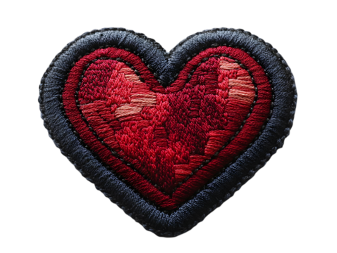 Embroidered red heart patch with black border, symbolizing love and craftsmanship.