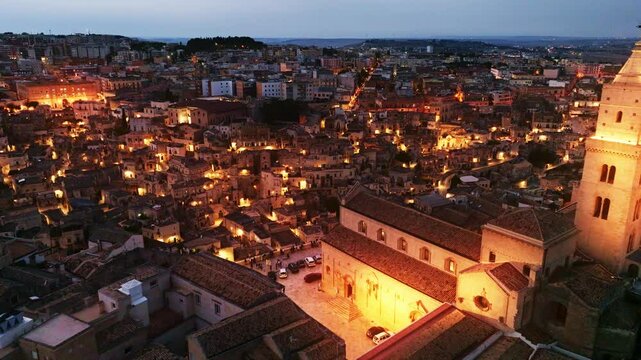 night aerial view of historic Italian town in Puglia, southern Italy, tourism in Italy, medieval town of Matera at night, drone view, aerial view of ancient Italian city