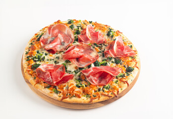 Pizza with prosciutto, ham, arugula, spinach, tomatoes, pesto, cheese and parmesan. Italian cuisine. 