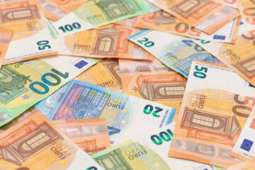 Fototapeta premium Different Euro Banknotes Money Background. Euro Money Currency. Colored Paper Money. A Lot of Fifty Euro Bills. Business, Finances, Cash and Money Saving Concept
