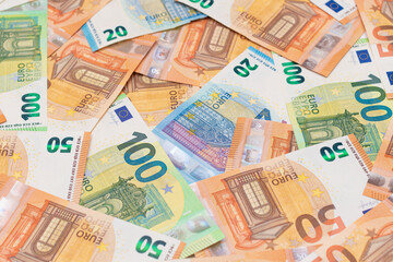 Different Euro Banknotes Money Background. Euro Money Currency. Colored Paper Money. A Lot of Fifty Euro Bills. Business, Finances, Cash and Money Saving Concept