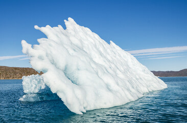 View of glaciers and icebergs in the fjords of South Greenland.