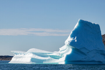 View of glaciers and icebergs in the fjords of South Greenland.