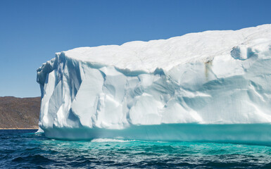 View of glaciers and icebergs in the fjords of South Greenland.