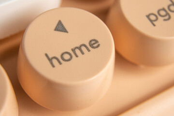 Close-up of a Home Key on a Peach-Colored Keyboard