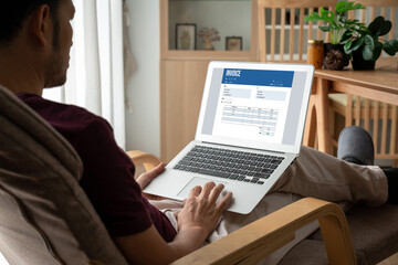 Invoice on computer screen from accounting application. Computer program for financial and budget of corporate business. Snugly.