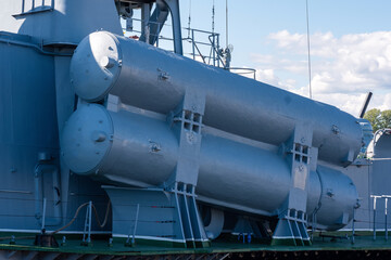 naval military background, concept, fragment of a modern warship with missile launcher containers