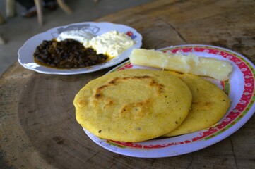 For breakfast, what is most eaten in Trujillo are Andean pastries, filled with meat or cheese, and...