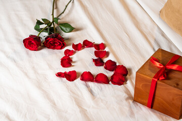 Romantic Setup with Roses and Gift Box