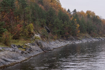 Oslo, Norway - October 20, 2024: Oslofjord (Oslofjorden), view of the bay and the island. Autumn forest