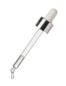 Drop of serum falls from glass pipette