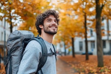 Obraz premium Portrait of a man in a gray suit standing confidently outside an urban building showcasing modern business fashion trends and formal menswear styling