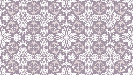 A repeating pattern of stylized flowers in white on a light purple background, creating a symmetrical, intricate design.