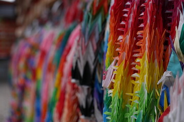 Colorful Origami Cranes Symbolizing Peace and Hope