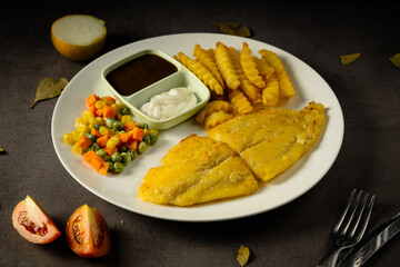 Delicious Fried Fish with Fries and Sauce